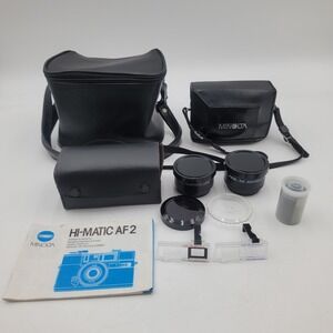 Minolta Hi-Matic AF2 35mm Film Camera Bundle with Aux Lenses Manual and Case
